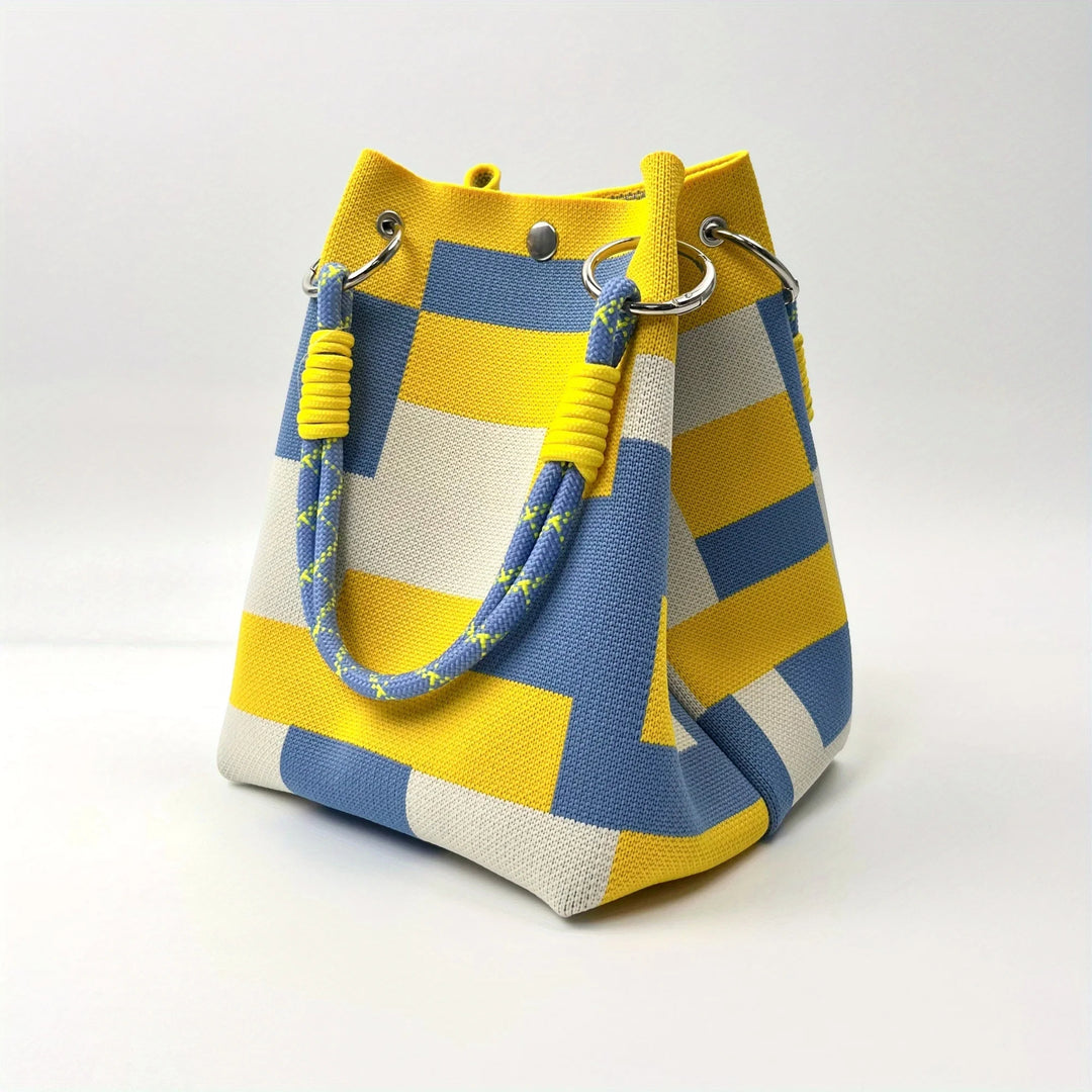 Woven bucket bag in blue and yellow geometric pattern with rope handle